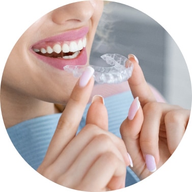 Woman Putting In Her Clean Aligners
