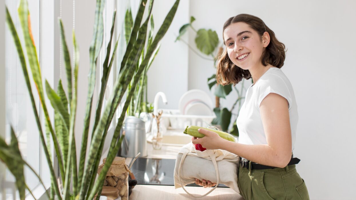 smiley-woman-holding-organic-vegetables